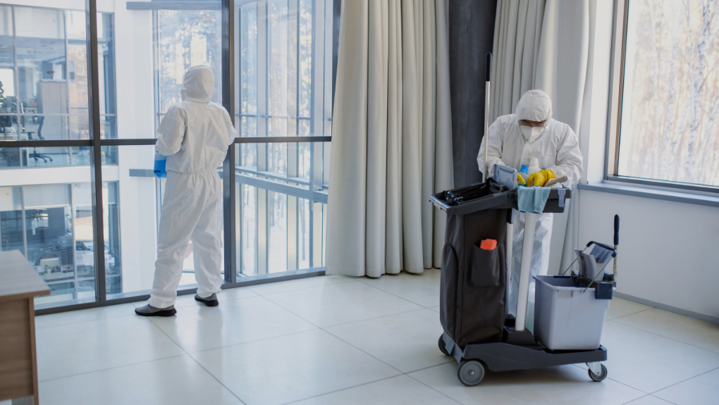 MC Cleaning Service technician in full PPE with professional cleaning equipment in a healthcare facility
